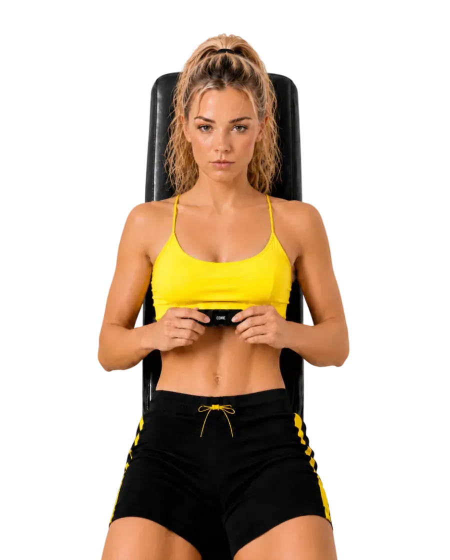 Athlete seated, holding the COR5 device before training